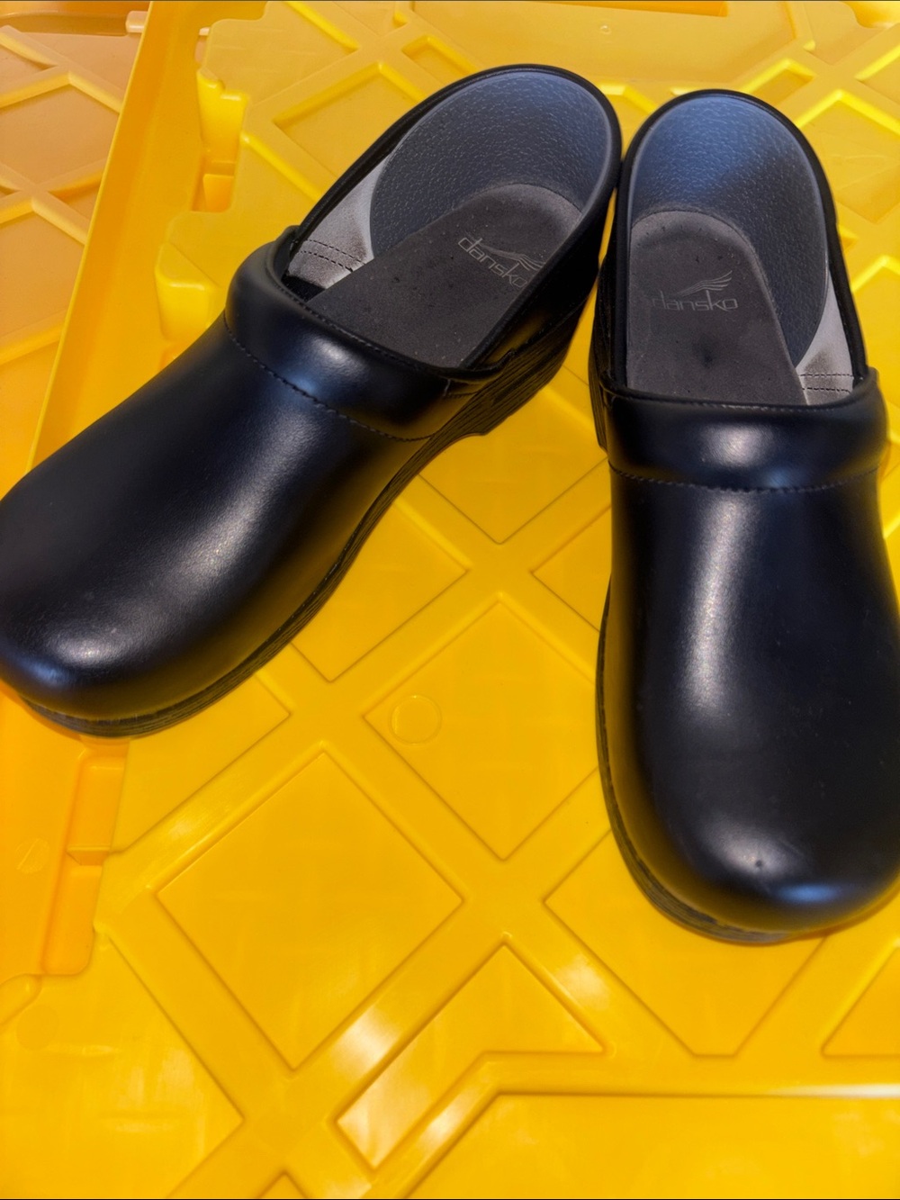 Dansko  Black Slip-On Clogs with Supportive Footbed - Picture 10 of 11
